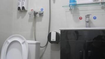 Shower, free toiletries, hair dryer, slippers