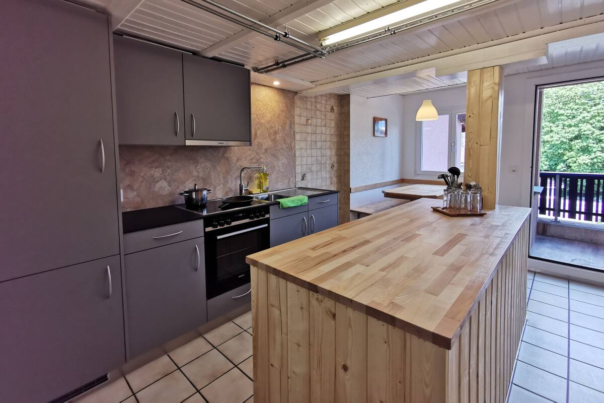 Comfort Apartment, 2 Bedrooms, Balcony (add. final cleaning fee CHF 30) | Private kitchen | Fridge, microwave, stovetop, cookware/dishes/utensils