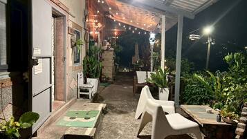 Exclusive Quadruple Room, 2 Double Beds, Patio, Ocean View | Terrace/patio