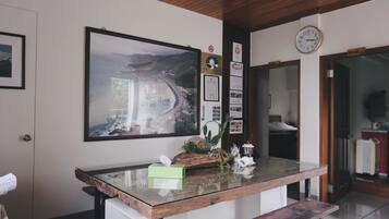 Family Quadruple Room, 2 Queen Beds | Living area | 80-cm flat-screen TV with cable channels