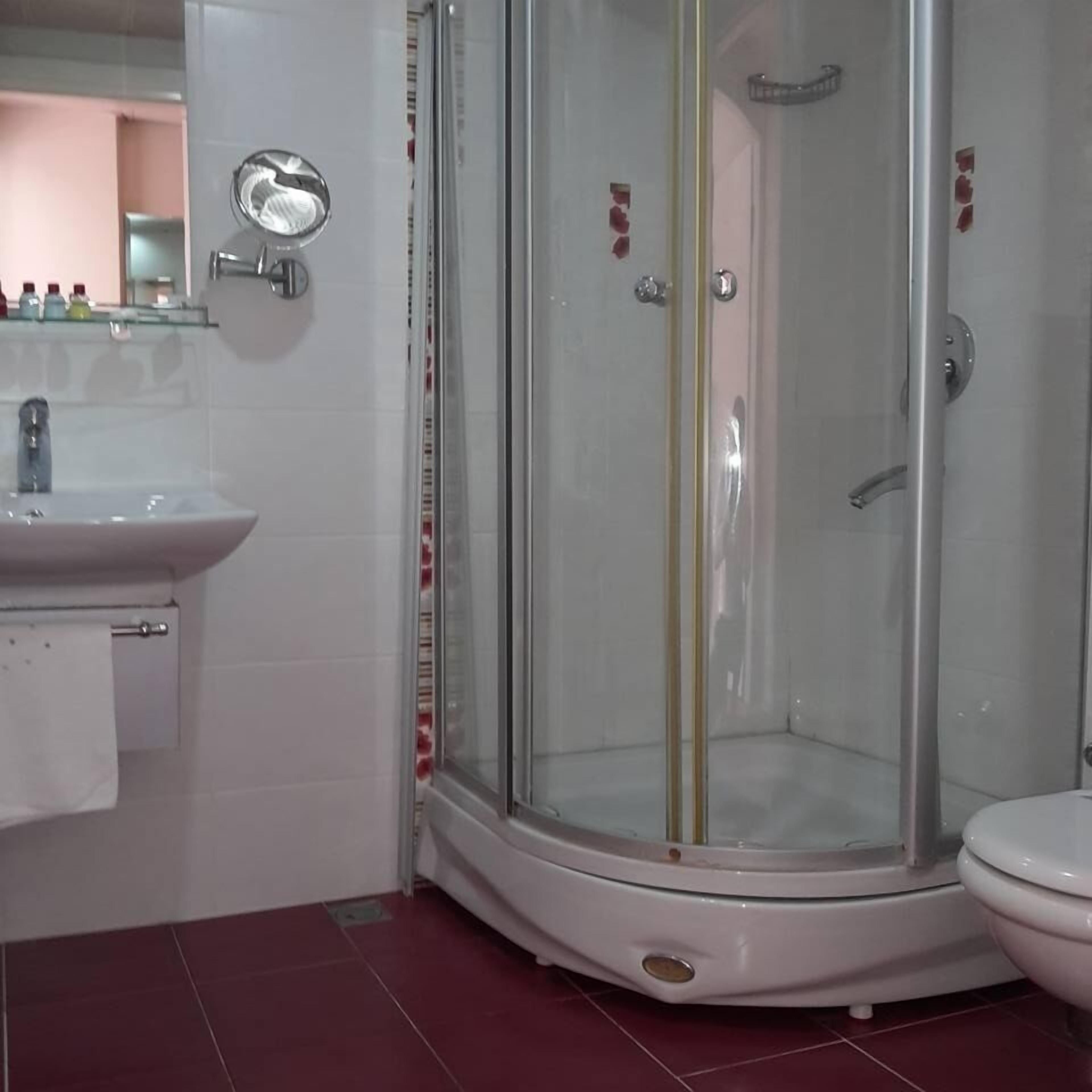 shower, free toiletries, hair dryer, dressing gowns