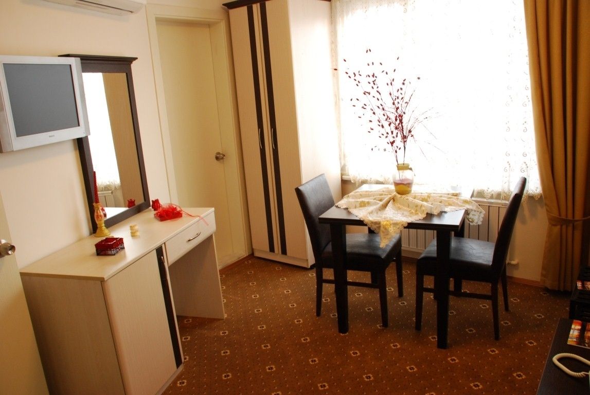 family triple room | living area | lcd tv