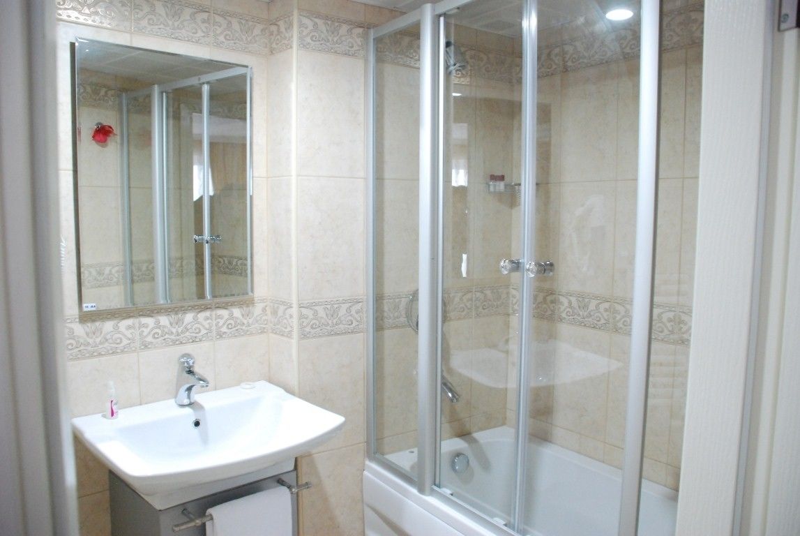 shower, free toiletries, hair dryer, dressing gowns