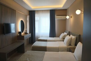 舒适客房 | 迷你吧、办公桌、笔记本电脑工作区、免费 WiFi