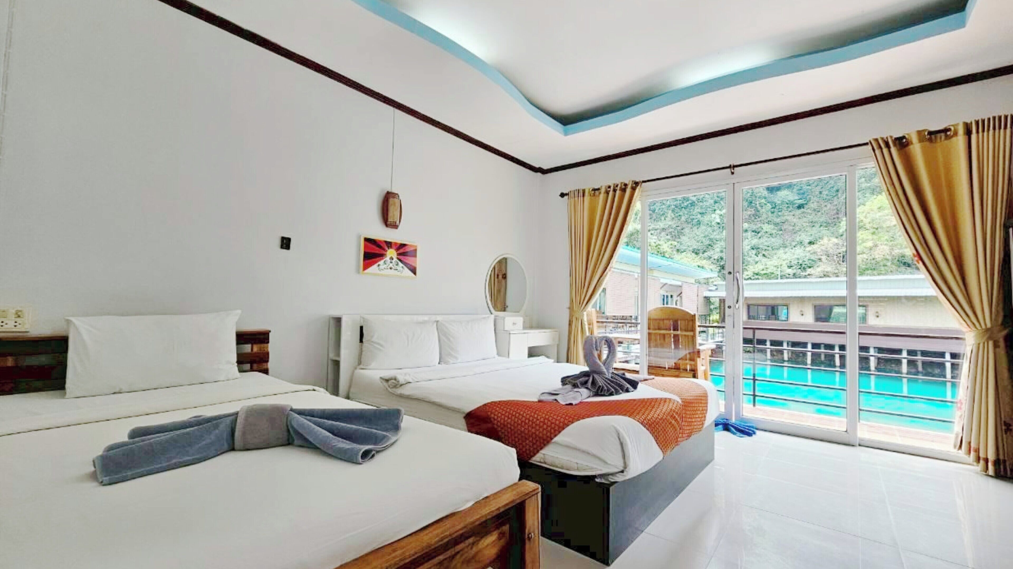 Family Room, Lake View | Desk, blackout drapes, free WiFi, bed sheets