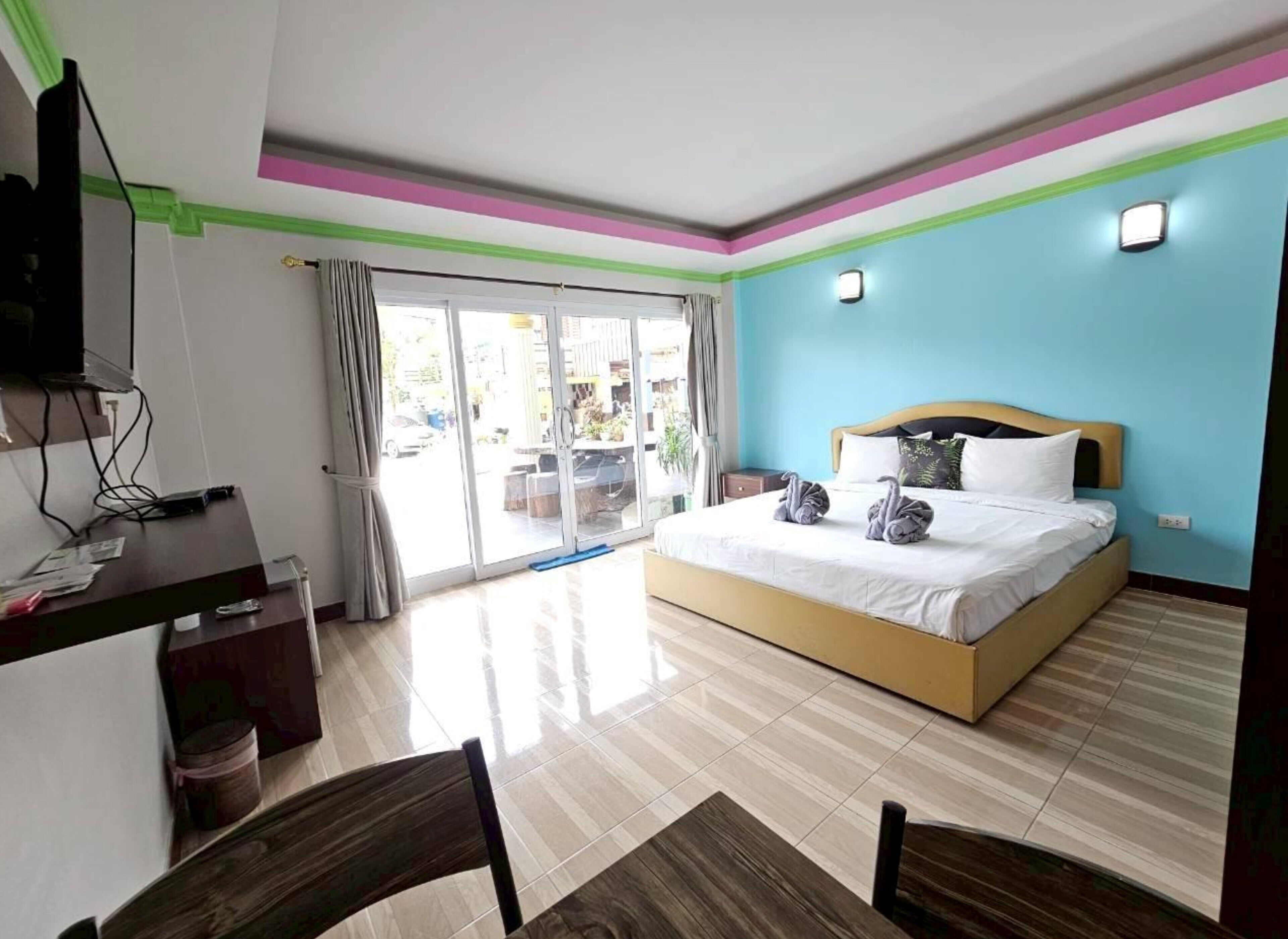Desk, blackout curtains, free WiFi, bed sheets