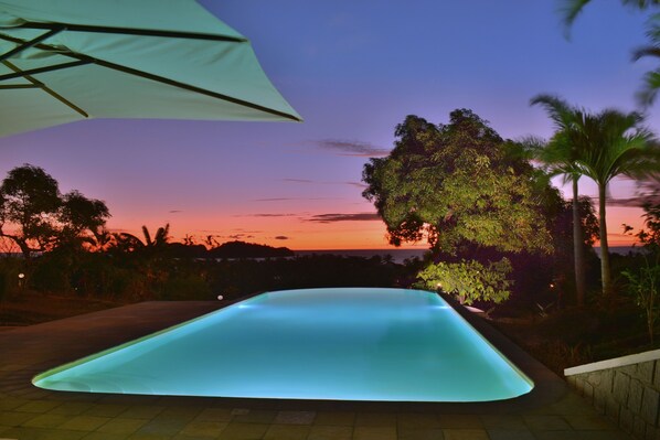 Outdoor pool, pool umbrellas, sun loungers