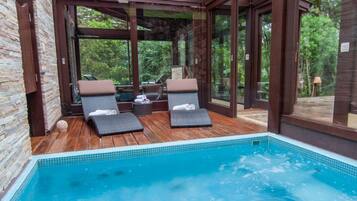 Design Chalet | Living area | LCD TV, fireplace