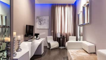 Luxury Suite, 1 Bedroom, Balcony | Living area | Flat-screen TV, first-run movies