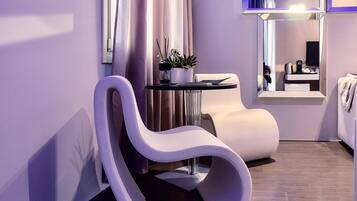 Luxury Suite, 1 Bedroom, Balcony | Living area | Flat-screen TV, first-run movies