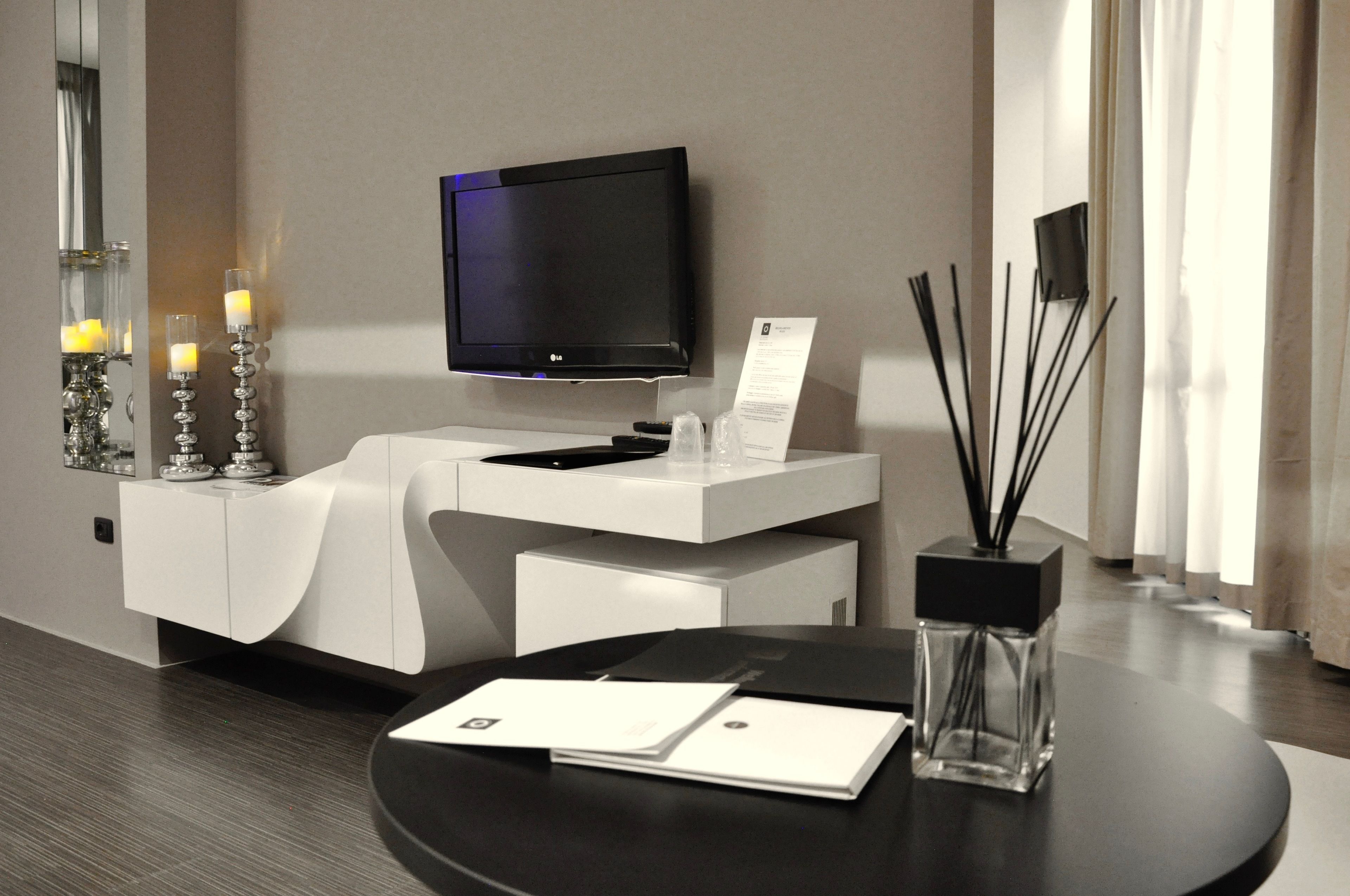 luxury suite, 1 bedroom, balcony | living area | flat-screen tv, first-run films