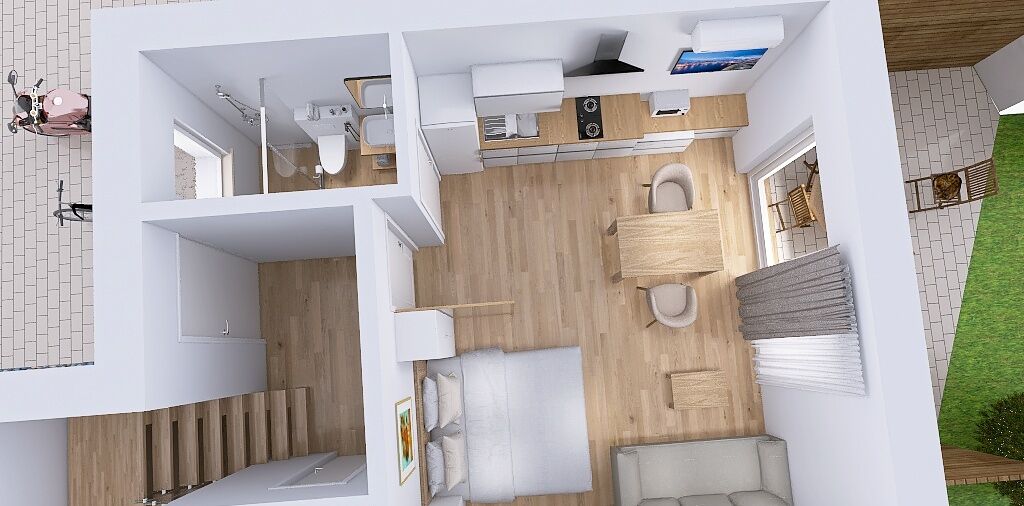 Ein modernes Interieur mit Küche, Essbereich und Treppe.