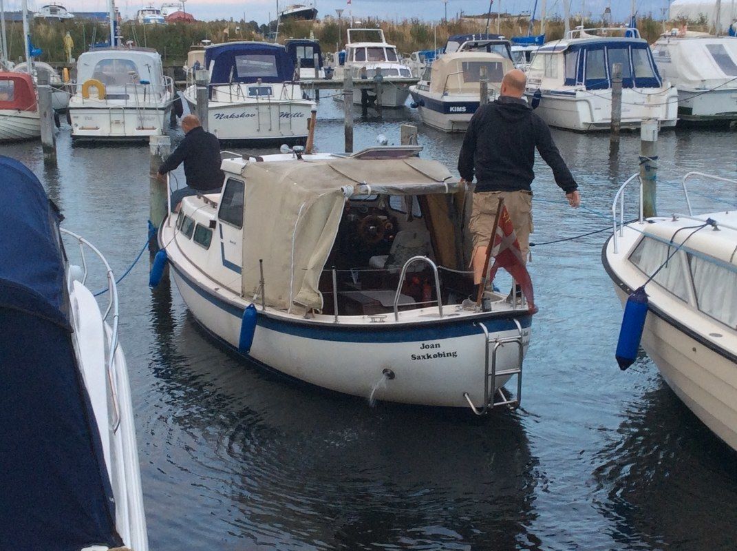 A marina with several boats docked.