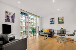 Exclusive Apartment, 1 Bedroom, Kitchenette, City View | Living area | 32-inch flat-screen TV with cable channels, TV - Times Square Serviced Apartments (London)