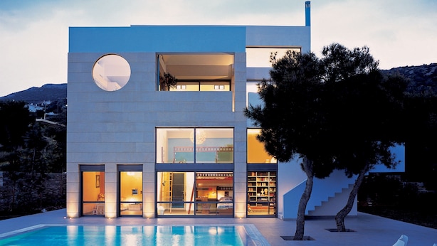 A modern two-story house with a swimming pool, large windows, and a staircase leading to the upper floor. - Minimal Blue Villa (Markopoulo Mesogaias)