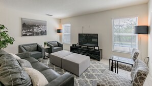 House, 4 Bedrooms, Private Bathroom | Living room | 55-inch flat-screen TV with cable channels, TV - 4 bed House/w pool & Garage (Kissimmee)