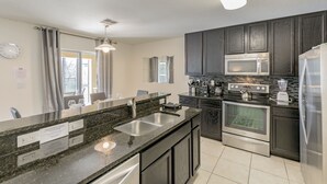 House, 4 Bedrooms, Private Bathroom | Private kitchen | Coffee/tea maker, full-sized fridge, microwave, oven - 4 bed House/w pool & Garage (Kissimmee)