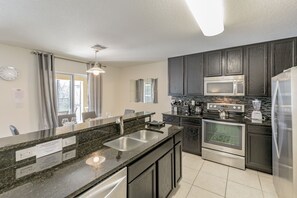 House, 4 Bedrooms, Private Bathroom | Private kitchen | Full-size fridge, microwave, oven, stovetop - 4 bed House/w pool & Garage (Kissimmee)