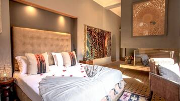 Down comforters, pillowtop beds, minibar, individually decorated