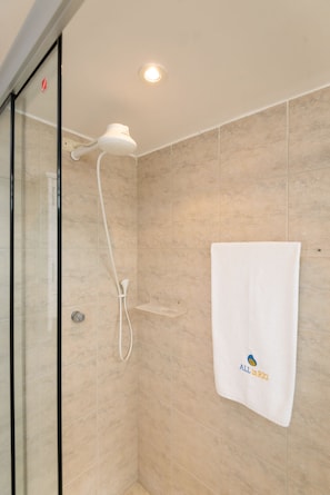 Economy Apartment | Bathroom | Shower, bidet, towels, soap