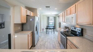 House, 6 Bedrooms, Private Pool | Private kitchen | Full-sized fridge, microwave, oven, stovetop - 6 bed Pool house -Garage (Kissimmee)