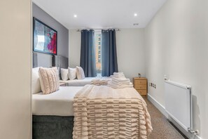 Classic Apartment, 2 Bedrooms, City View | 1 bedroom, desk, laptop workspace, cribs/infant beds