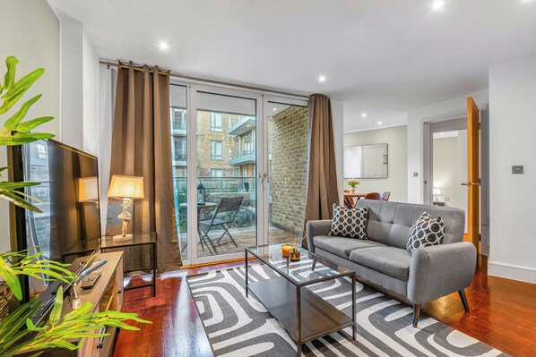 Classic Apartment, 2 Bedrooms, City View | Living area | 32-inch flat-screen TV with cable channels, TV