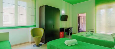 Family Double or Twin Room, Garden View, Garden Area | Minibar, in-room safe, desk, laptop workspace