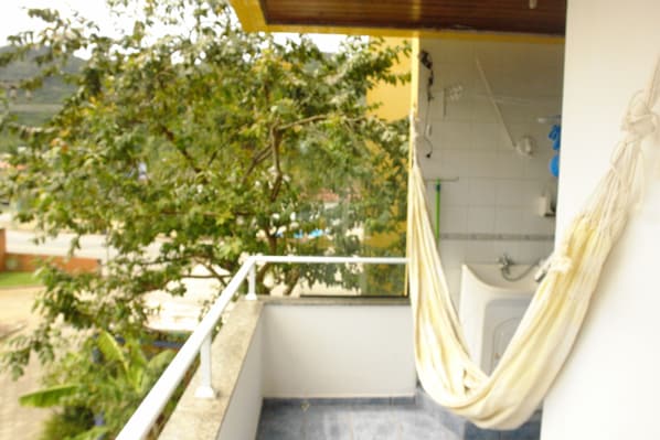 Apartamento conforto, 2 quartos | Sacada