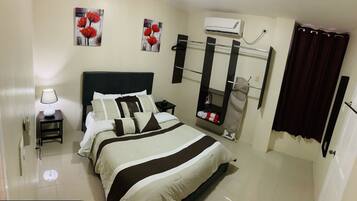 Exclusive Condo, 1 Bedroom, Mountain View, Poolside | Premium bedding, minibar, in-room safe, iron/ironing board