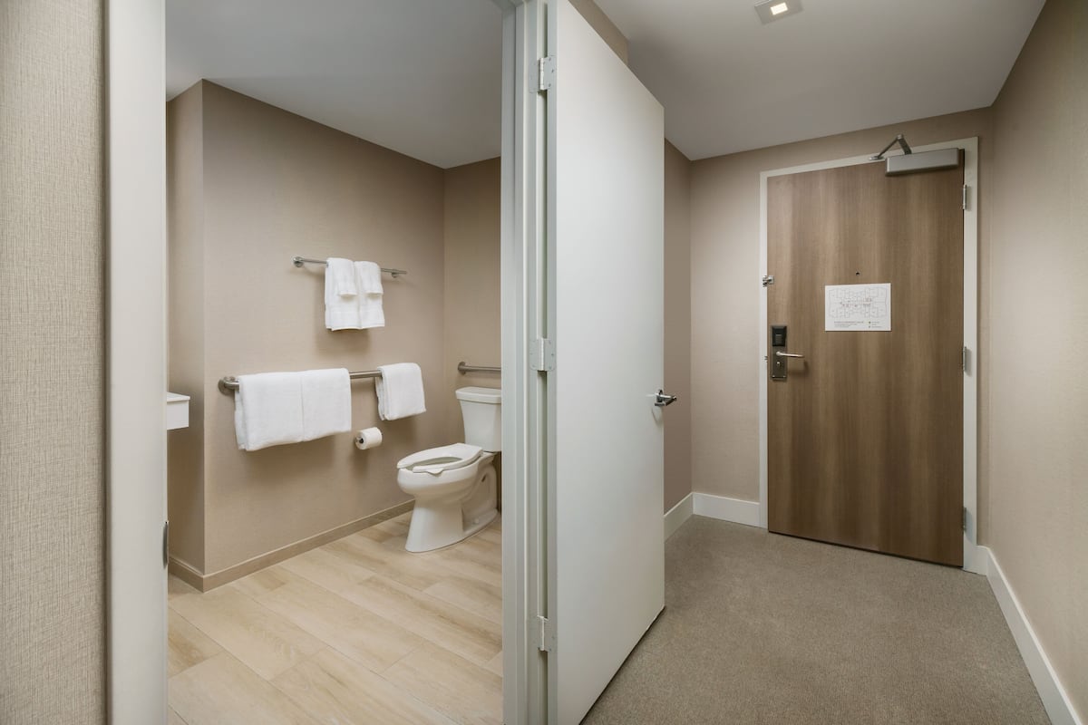 shower, hair dryer, bathrobes, towels