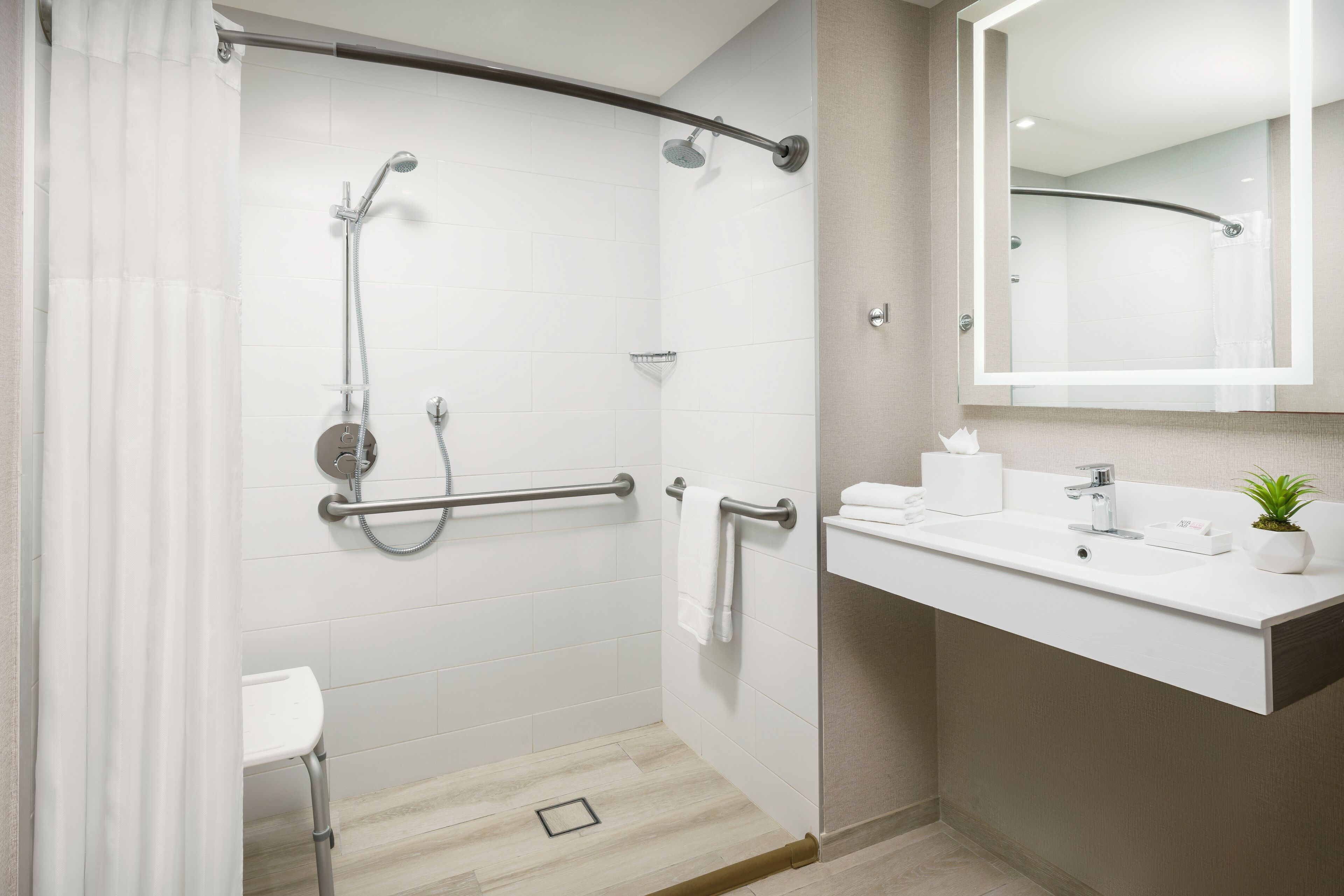 shower, hair dryer, bathrobes, towels