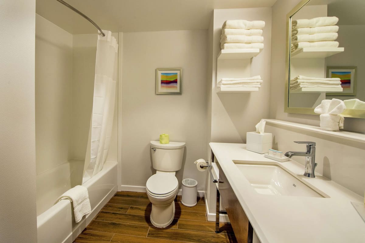 standard room, 2 queen beds, bathtub | bathroom | free toiletries, towels