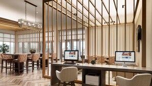 A modern office space with two desks, chairs, and a large window. - Embassy Suites by Hilton San Antonio Landmark (San Antonio)