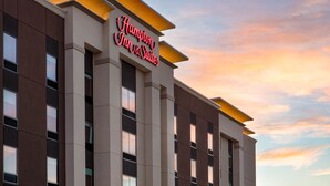 A hotel with a modern facade and a sign reading "Hampton Inn & Suites." - Hampton Inn & Suites St. George, UT (St. George)