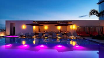 Outdoor pool, pool umbrellas, pool loungers