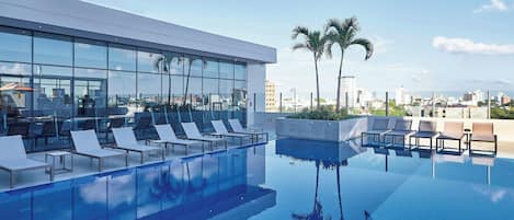 Outdoor pool, pool umbrellas, pool loungers