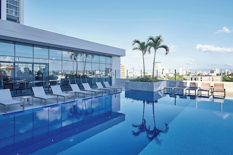 Outdoor pool, pool umbrellas, sun loungers