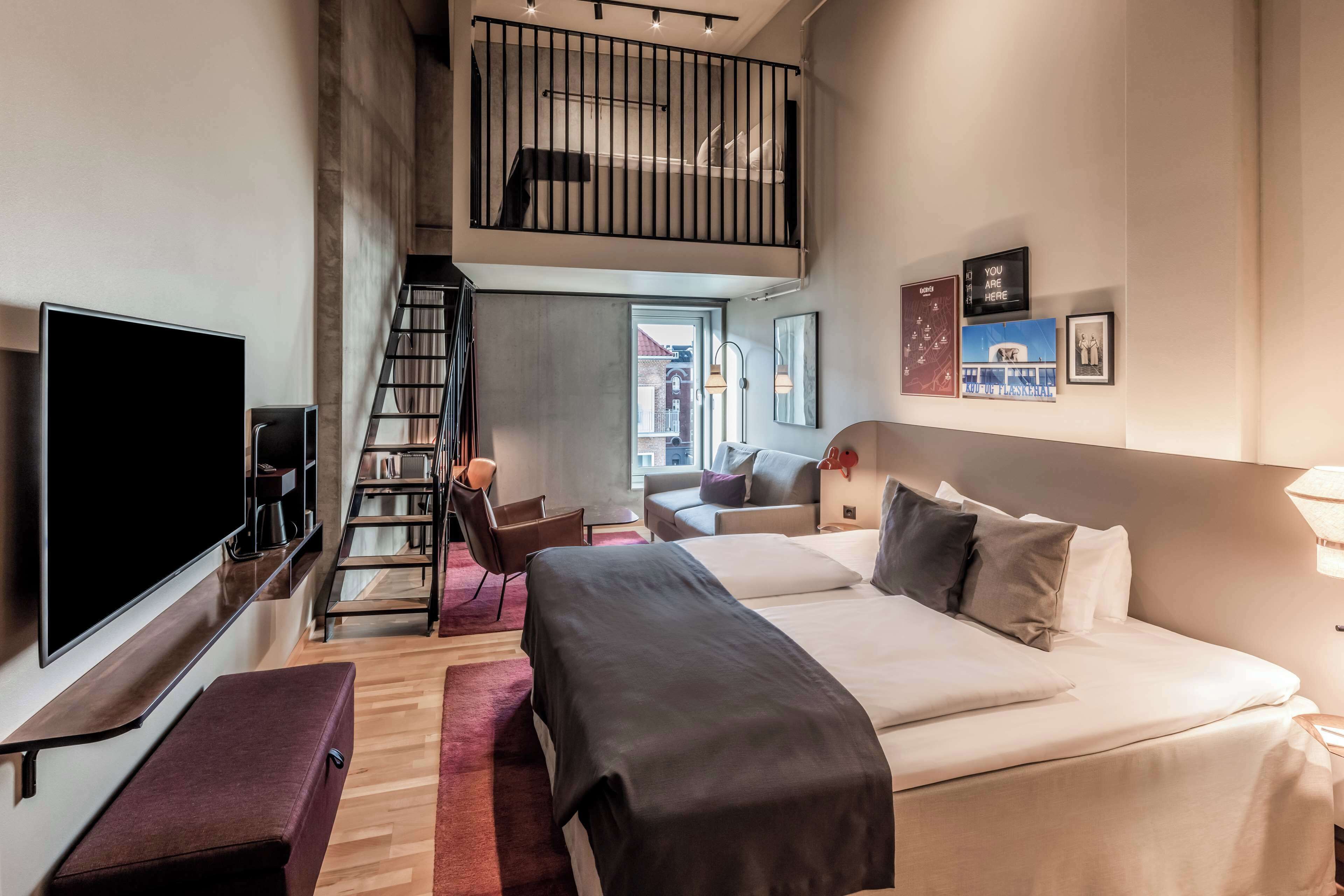 junior suite | 1 bedroom, in-room safe, iron/ironing board, free wifi