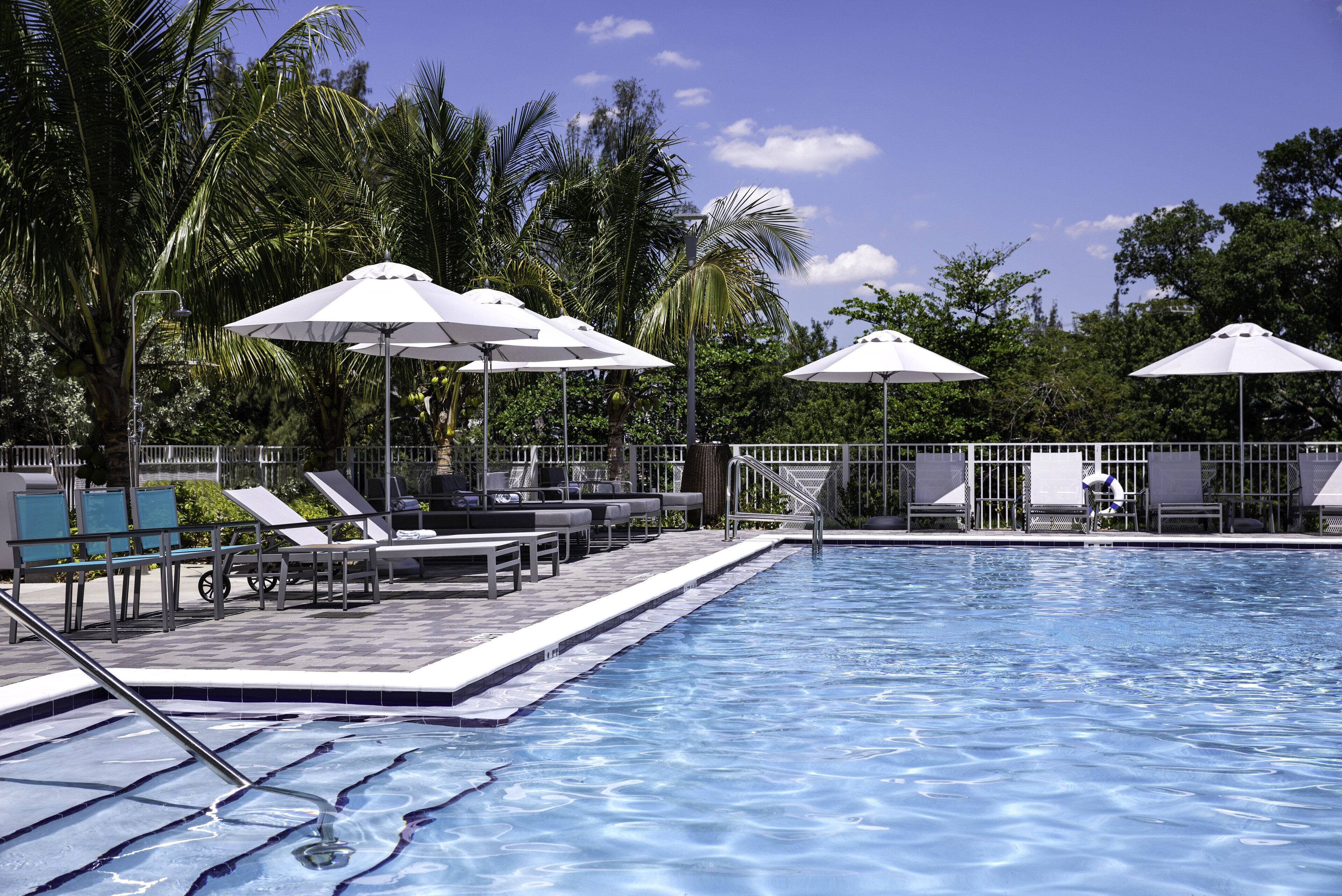 Outdoor pool, open 8:00 AM to 7:00 PM, free pool cabanas, pool umbrellas