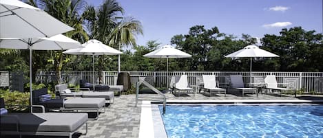 Outdoor pool, free pool cabanas, pool umbrellas