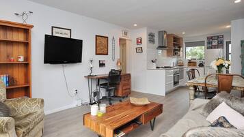 Charles St Apartment | Living area | Flat-screen TV