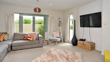 St Albans St Villa | Living area | Flat-screen TV