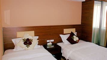 Minibar, desk, blackout curtains, iron/ironing board