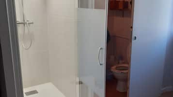 Shower, hair dryer, toilet paper