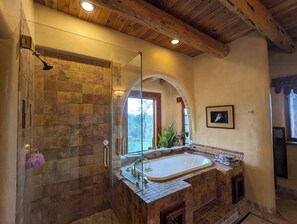 Bathtub, hair dryer, towels, soap