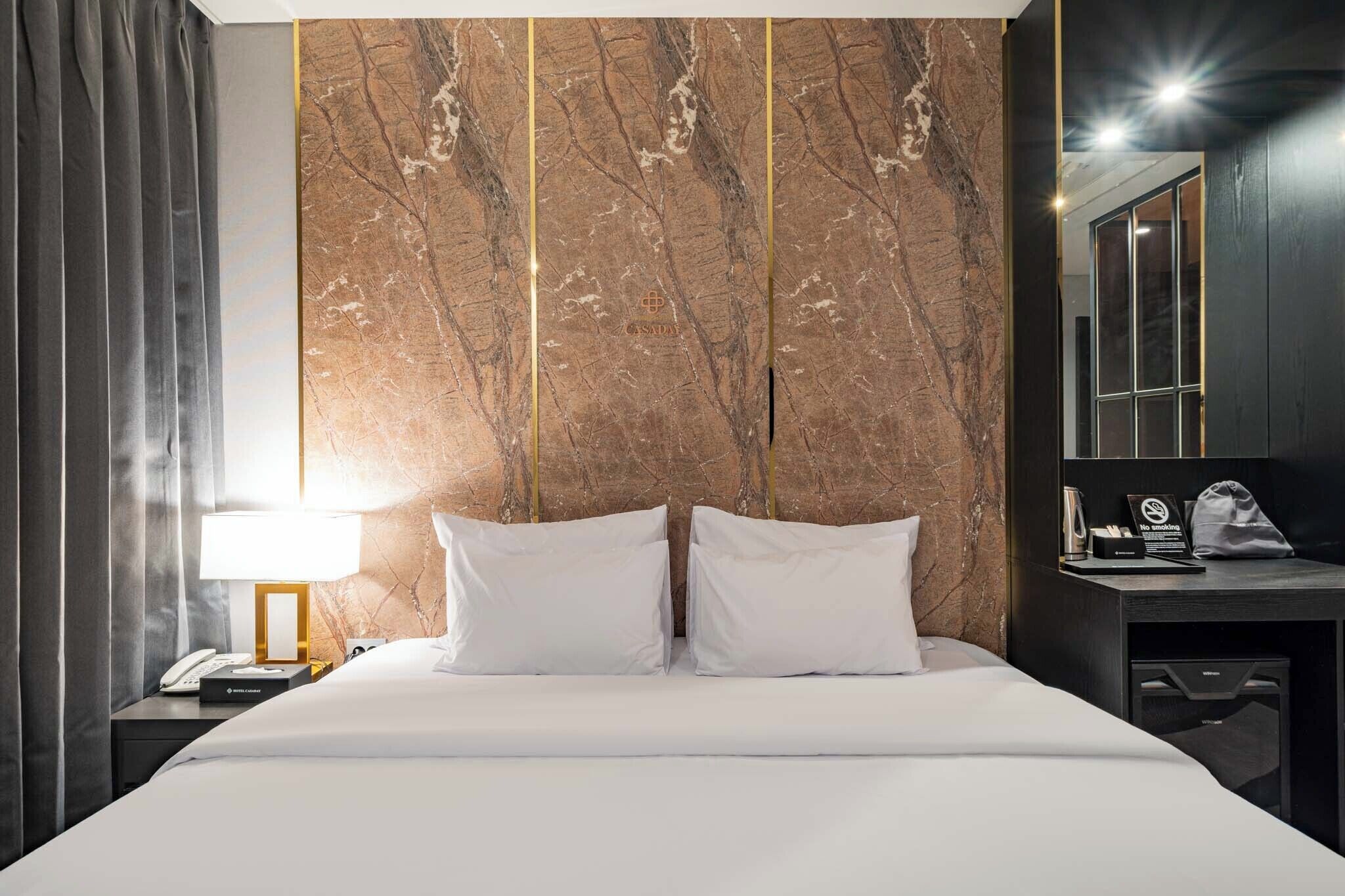 premium double room | frette italian sheets, premium bedding, desk, laptop workspace