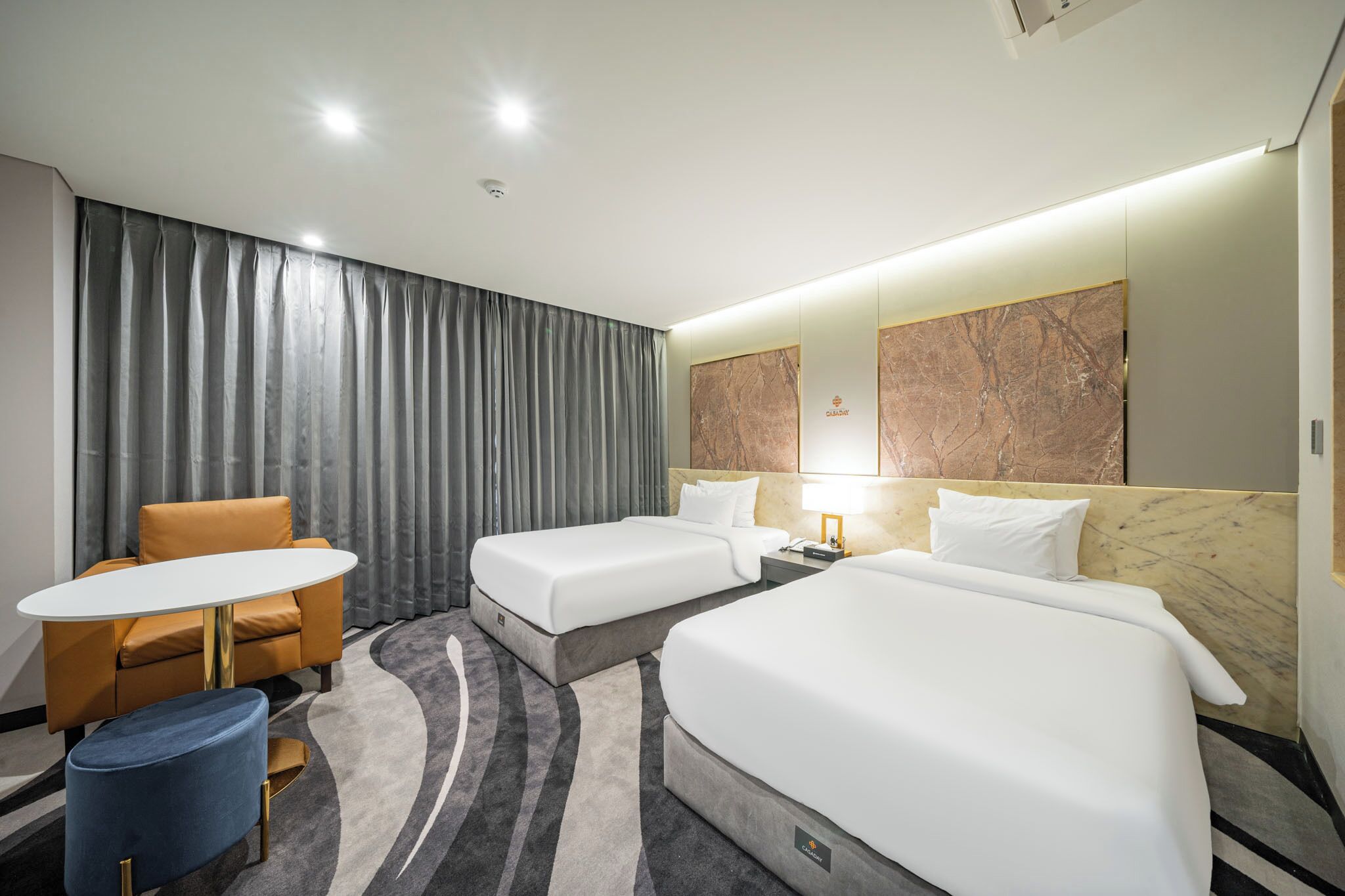 deluxe twin room | frette italian sheets, premium bedding, desk, laptop workspace