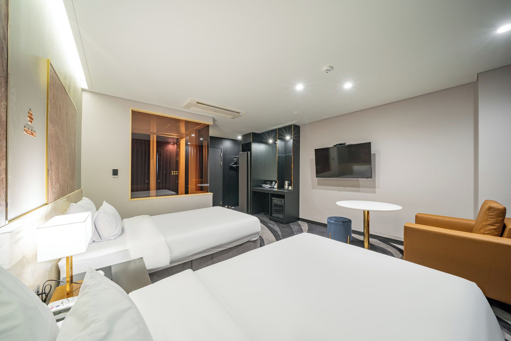 deluxe twin room | frette italian sheets, premium bedding, desk, laptop workspace