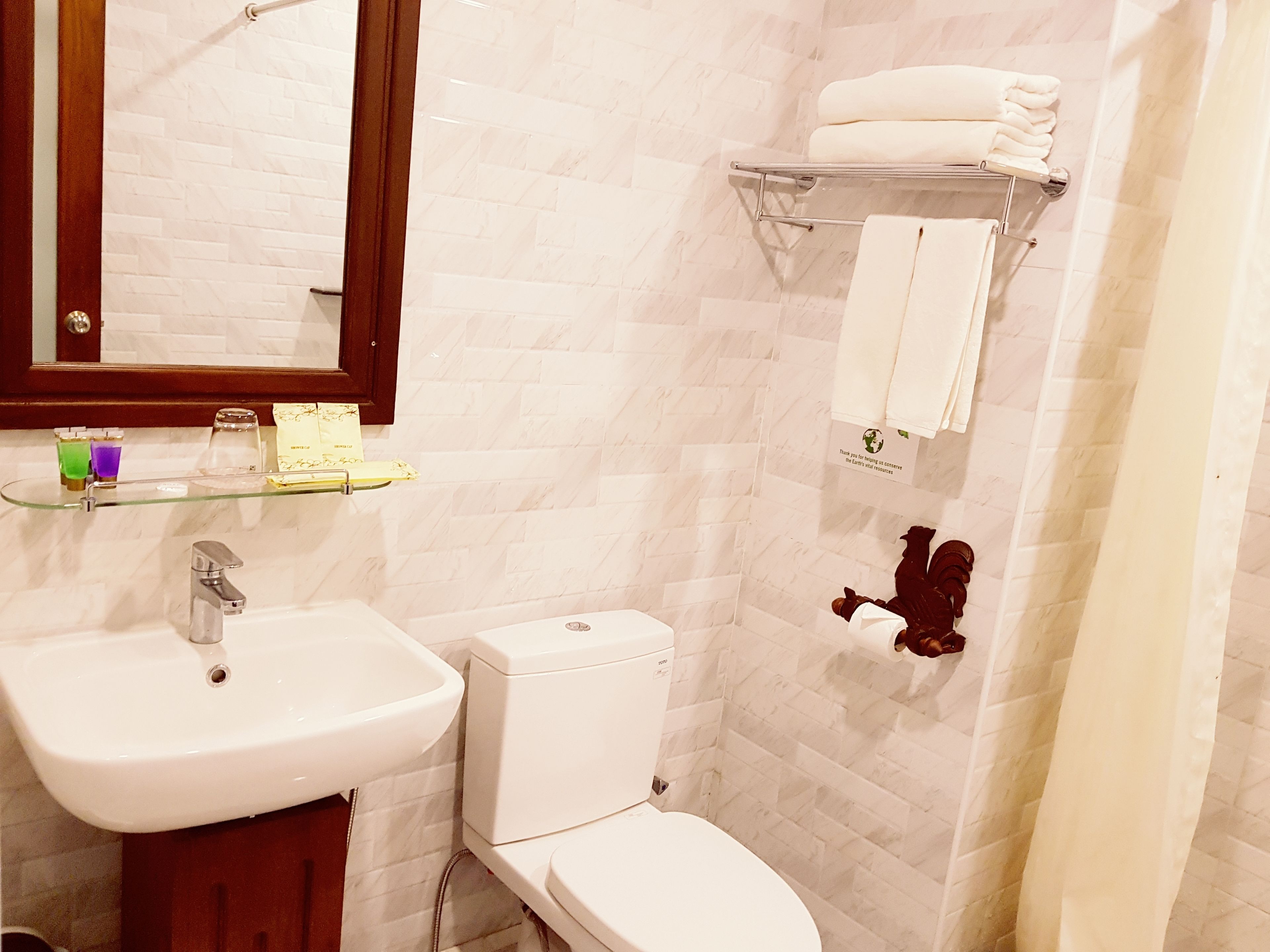 shower, free toiletries, hair dryer, slippers